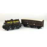 A good O-gauge model of a goods wagon, 'Glass Lined United Dairies Milk Tank', plus one (2)