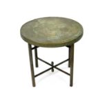 A folding brass and wood occasional table