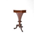 A Victorian walnut octagonal form trumpet work table