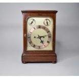 An early 20th century mahogany mantel clock