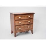 A 19th century mahogany veneered ‘apprentice’, miniature chest