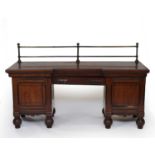 A Victorian mahogany pedestal sideboard