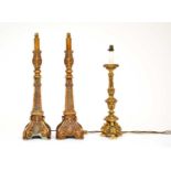 A pair of reproduction giltwood table lamps and another similar