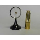 A Goerz-Werk 'mystery' barometer and a brass pocket telescope