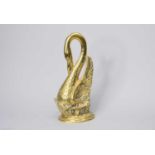 A Victorian brass doorstop, in the form of a swan