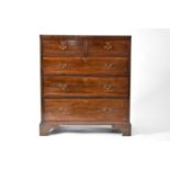 An early 19th century mahogany rectangular chest of drawers