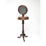 A Victorian mahogany floor standing dressing/shaving mirror