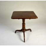 An early-mid 19th century mahogany and walnut tripod table