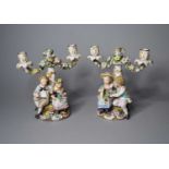 A pair of John Bevington porcelain figural candelabra