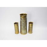 Trench Art:- A WWI brass artillery shell, dated 1914-1918, a similarly dated pair and a matchbox (4)