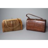 Two vintage leather handbags