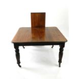 A circa 1900, mahogany extending dining table