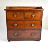 A small early to mid-19th century rectangular mahogany chest of drawers