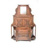 A Renaissance style stained oak bench-cum hallstand