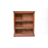 A small Edwardian mahogany open bookcase