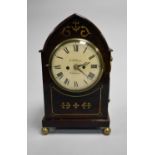 A 19th century mahogany arch-top bracket or mantel clock, J. Tilbury of Guernsey