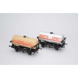 A good O-gauge model of a goods wagon, 'Motor Shell Spirit' and another 'Pratts Spirit' (2)