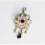 An early 20th century amethyst and split seed pearl brooch/pendant