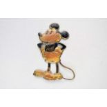 A 1930s stamped metal figure of Mickey Mouse (car radiator mascot), 14.5cm long
