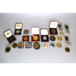A collection of thirty-seven silver, copper and bronze medals/medallions
