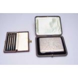 A cased Victorian silver aide memoir and card case