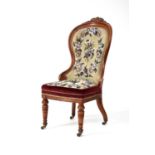A 19th century mahogany beadwork upholstered boudoir chair