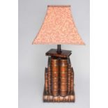 A carved wood bibliographic taste table lamp and another table lamp
