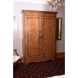 A reproduction walnut double wardrobe