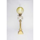 A Victorian brass Corinthian column oil lamp