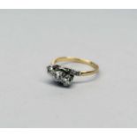 A graduated three stone diamond ring