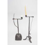 Two 18th century wrought iron table splint and candle holders