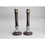 Of industrial interest: a pair of steel and brass candlesticks, made from industrial parts (2)