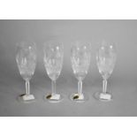 Four Waterford Crystal champagne flutes in the 'Colleen' pattern, 19.5cm high