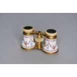A pair of gilt metal and enamel opera glasses by Howell James & Co