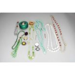 A collection of various pieces of costume jewellery