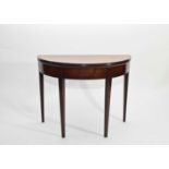 A George III demi-lune mahogany tea table