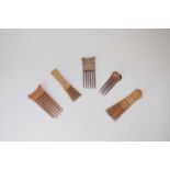 A collection of African tribal hair combs