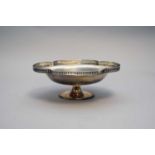 A silver pedestal lobed bowl