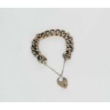 A rose metal hollow curb link bracelet