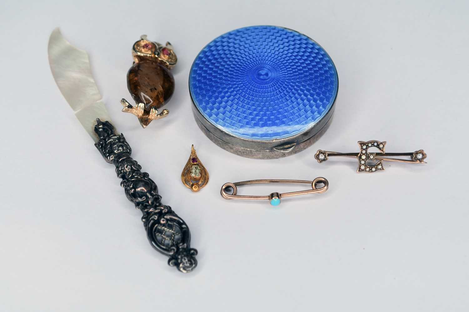 A small collection of jewellery and silver