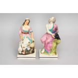 A pair of Staffordshire pearlware figures of Elijah and the Widow, early 19th century, 24.5cm