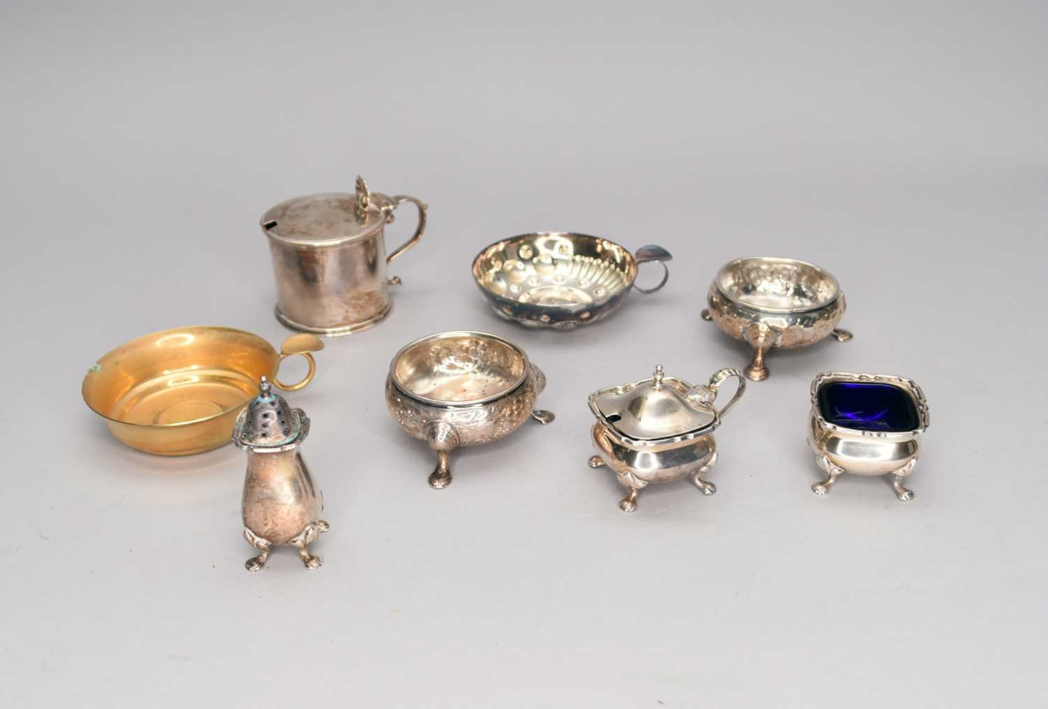 A collection of silver cruets