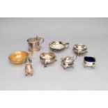 A collection of silver cruets