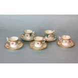 Five Coalport batwing demitasse coffee cups and saucers, rare colourways