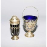 A silver sugar basket and silver sugar caster