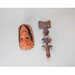 A painted wood Yoruba tribal staff and a small Ibibio mask