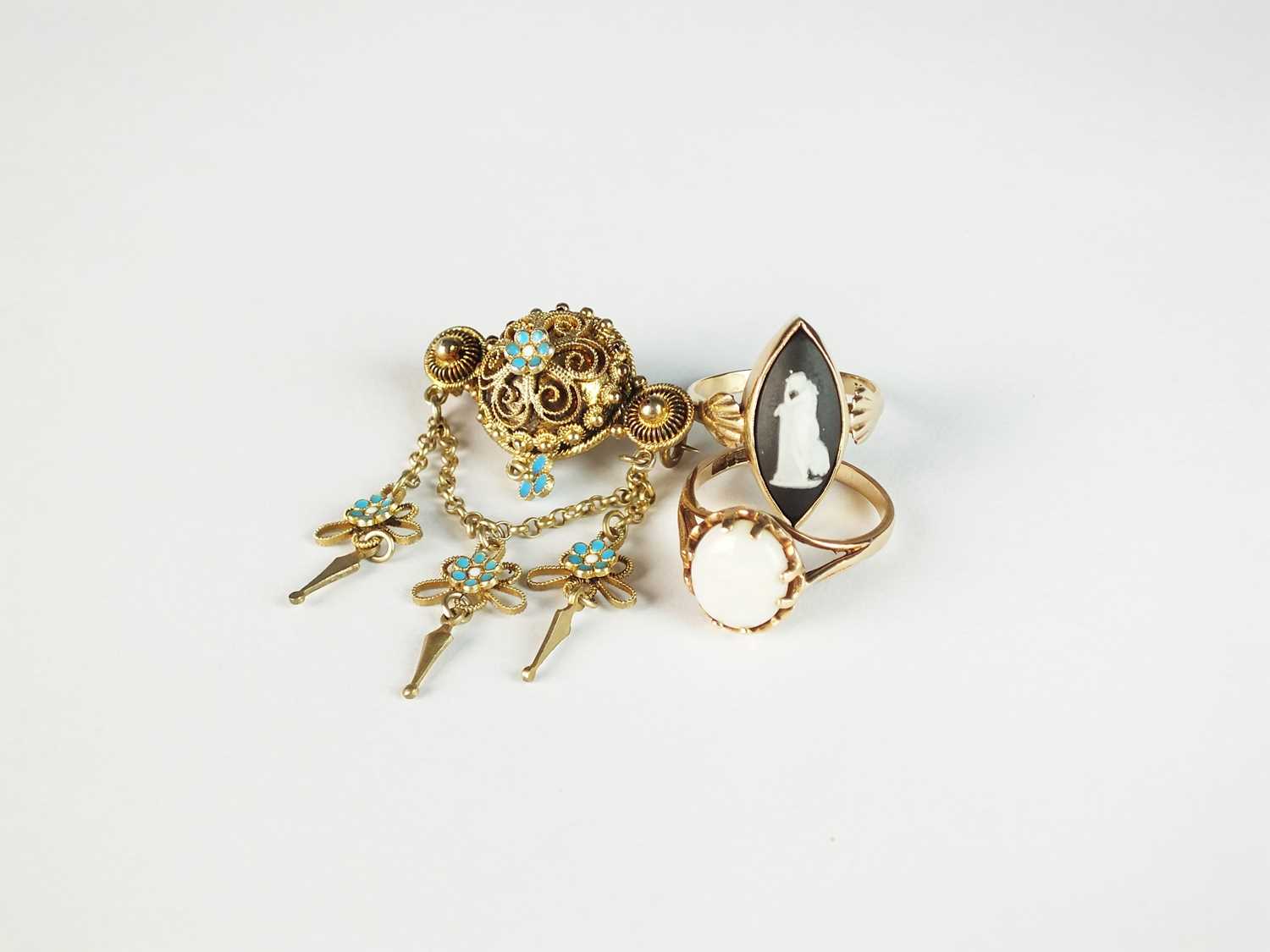 Two rings and a brooch