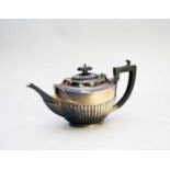 An early 20th century silver teapot