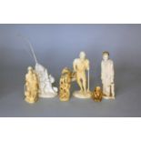 A group of Japanese ivory okimono and a netsuke