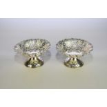 A pair of silver pierced pedestal bon bon dishes